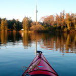 A photo of the Toronto skyline from a kayak.
