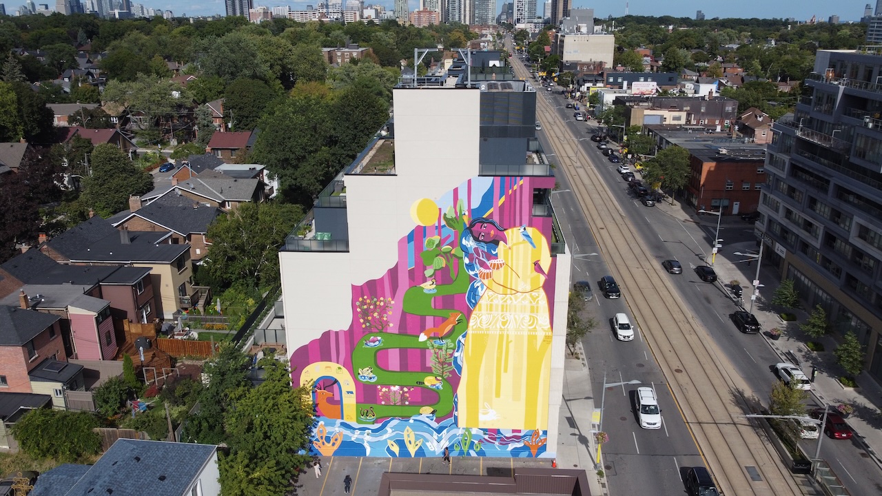 Yellow Oasis mural on St. Clair Avenue from a distance