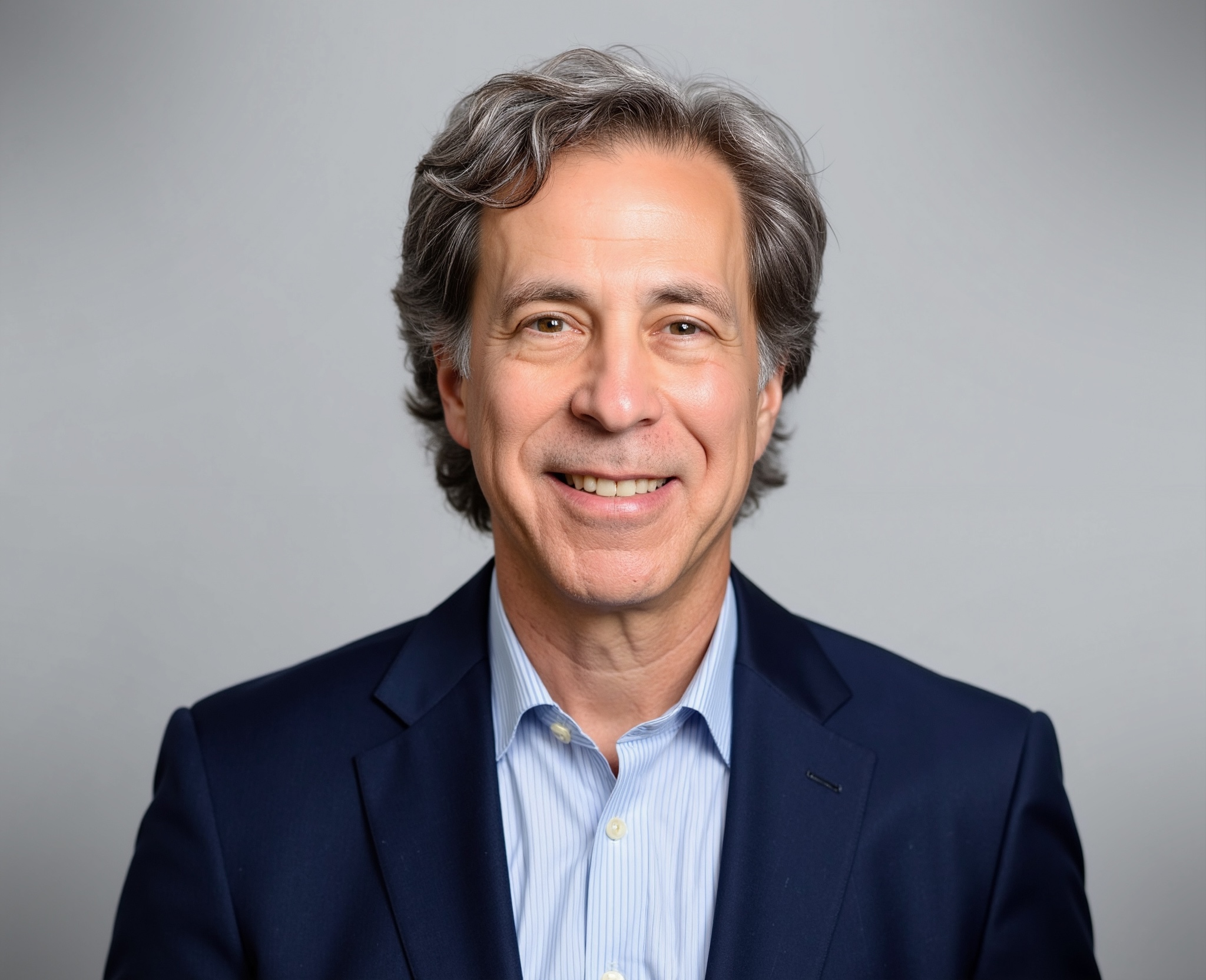 Bruce Young profile pic v6 light grey background open collar