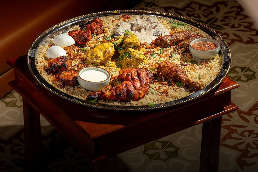 Traditional Hyderabadi mutton ghee roast and tandoori chicken platter at Aadab in Scarborough.