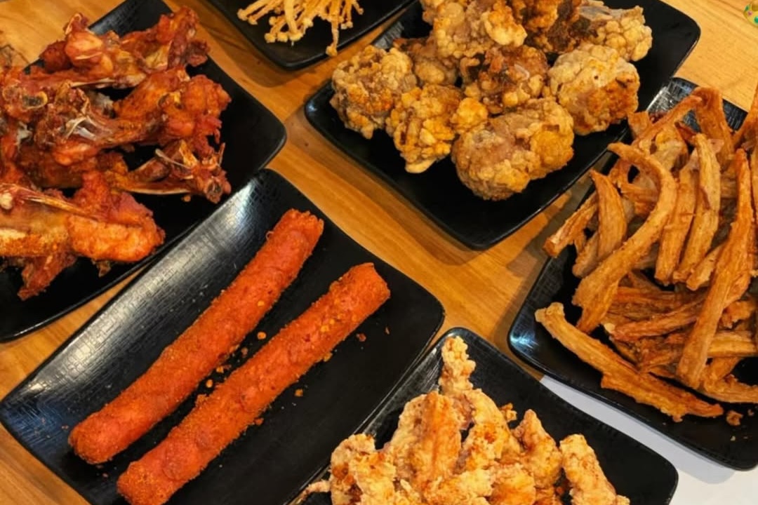 Steaming clay-pot potato noodles with marbled beef and tofu skin at Uncle Potato Noodle near Bay Street.